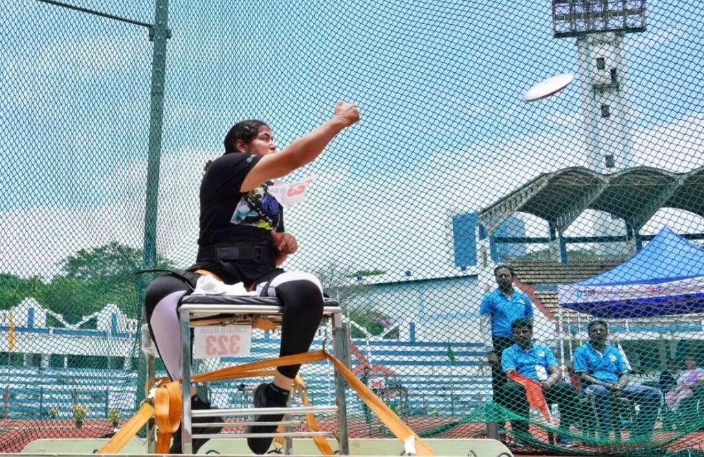 International sports person Sakshi Kasana throwing shotput.

